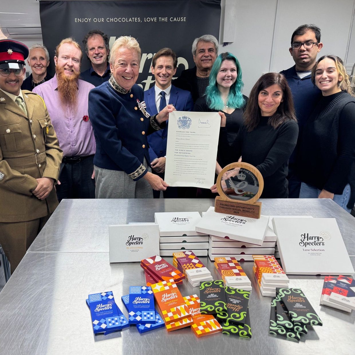 The Harry Specters team receiving the King's Award for Enterprise